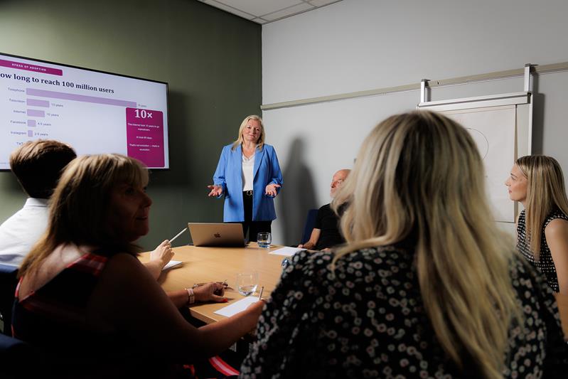 Lindsey leading an engaging, hands-on marketing training session
